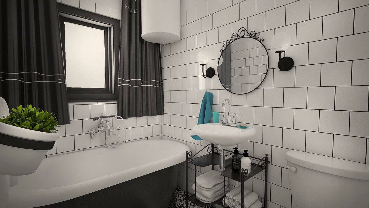 Opremljeno kupatilo sa belim keramičkim pločicama
